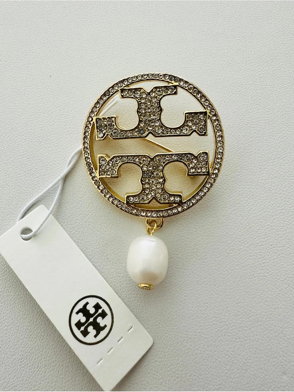 Tory Burch gold tone